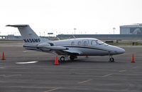 N456MF @ KOAK - Bigfork Logistics LLC (Bigfork, MT) 2007 Eclipse EA500visiting on North Field ramp @ Oakland International Airport, CA - by Steve Nation