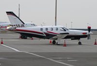 N850JR @ KOAK - 2006 Socata TBM 700 (TBM 850 registration) on North Field ramp @ Oakland International Airport, CA - by Steve Nation