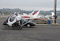 N2064Q @ KCCR - Brtistow Academy 1999 Schweizer 269C-1 minus rotor blades @ Buchanan Field, Concord, CA - by Steve Nation