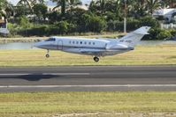 HB-VOQ @ TNCM - HB-VOQ landing at TNCM