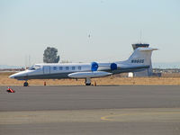 N96GS @ KAPC - Wings Service Limited Lerarjet 35 framed by control tower @ Napa County Airport, CA - by Steve Nation
