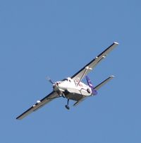 N844FE @ ONT - Sharp turn from base to final for runway 26L - by Helicopterfriend