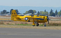 N306WW @ KAPC - 1955 T-28B BuAer 138306 in yellow US Navy training scheme marked as PA-410 and NX306WW taxis for take-off at Napa County Airport, CA home base - by Steve Nation