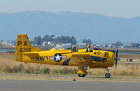 N306WW @ KAPC - 1955 T-28B BuAer 138306 in yellow US Navy training scheme marked as PA-410 and NX306WW taxis for take-off at Napa County Airport, CA home base - by Steve Nation