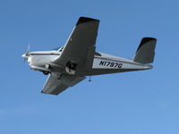 N1797G @ SZP - 1962 Beech P35 BONANZA, Continental IO-470-N 260 Hp, takeoff climb Rwy 22, gear coming up - by Doug Robertson