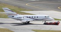 C-FSJI @ TNCM - C-FSJI being towed to the cargo ramp at TNCM - by Daniel Jef