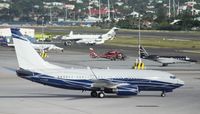 P4-NGK @ TNCM - P4-NGK taxing to parking on the main ramp at TNCM