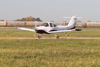 N136EJ @ TDZ - Arriving at the Toledo-Metcalf EAA breakfast fly-in. - by Bob Simmermon