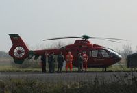 G-WASN @ EGFH - Newly delivered South Wales Air Ambulance helicopter (Helimed 57) being inspected by aircrew at it's Swansea Airport base. - by Roger Winser