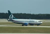 N240AT @ KRSW - Boeing 737-700 - by Mark Pasqualino