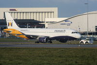 G-MONX @ EGGW - Monarch A320 being towed to the engine test bay - by Chris Hall