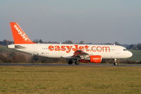 G-EZTE @ EGGW - easyJet A320 taxying to RW26 - by Chris Hall