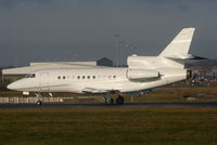 G-SABI @ EGGW - London Executive Aviation Falcon 900EX landing on RW26 - by Chris Hall