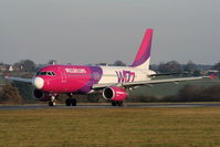 HA-LWB @ EGGW - Wizzair A320 departing from RW26 - by Chris Hall