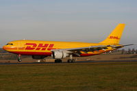 EI-OZH @ EGGW - DHL A300 touching down on RW26 - by Chris Hall