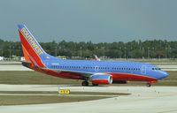 N258WN @ KRSW - Boeing 737-700 - by Mark Pasqualino