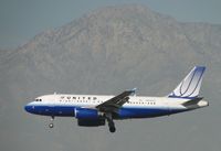 N813UA @ ONT - On final to runway 26R - by Helicopterfriend