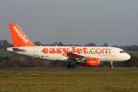 G-EZIU @ EGGW - easyJet A319 taxying to RW26 - by Chris Hall