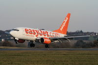 G-EZKC @ EGGW - easyJet B737 departing from RW26 - by Chris Hall