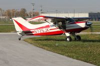 N725JK @ TDZ - Arriving at the EAA breakfast fly-in at Toledo, Ohio