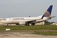 N16713 @ TNCA - The Guppy with winglets taxing during sunset