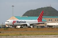 PH-MCI @ TNCA - Martin Air's inaugural flight to Aruba. Notice the Hooiberg hill in the background
