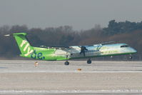 G-JEDP @ EGCC - flybe Dash-8 landing on RW05L - by Chris Hall