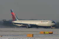 N189DN @ EGCC - Delta B767 lining up on RW05L - by Chris Hall