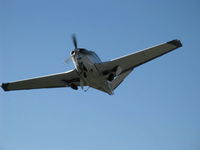 N541DB @ SZP - 1964 Beech S35 BONANZA, Continental IO-520-B 285 Hp, fast takeoff climb Rwy 22, gear coming up - by Doug Robertson