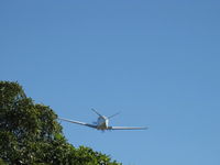 N541DB @ SZP - 1964 Beech S35 Bonanza, Continental IO-520-B 285 Hp, fast takeoff climb Rwy 22, gear nearly up - by Doug Robertson