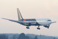 G-POWD @ EGCC - Titan Airways B767 on finals for RW05L - by Chris Hall