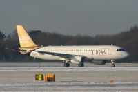 5A-LAI @ EGCC - Libyan Airways A320 departing from RW05L - by Chris Hall