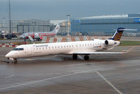 D-ACNH @ EGCC - 2009 Canadair Regional Jet CRJ-900, c/n: 15247 awaiting early morning departure from Manchester Terminal 1 - by Terry Fletcher