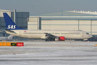LN-RRU @ EGCC - Scandinavian B737 landing on RW05L - by Chris Hall