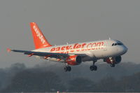G-EZGC @ EGCC - easyJet A319 on finals for RW05L - by Chris Hall