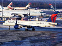N727TW @ EGCC - Delta B757 taxying to RW05L - by Chris Hall