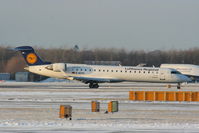 D-ACPG @ EGCC - Lufthansa CRJ landing on RW05L - by Chris Hall