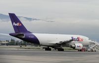 N405FE @ ONT - Parked east of the Fed Ex facility waiting to be loaded - by Helicopterfriend