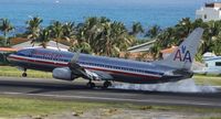 N919AN @ TNCM - American airlines N919AN landing at TNCM