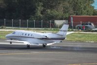 N634QS @ TNCM - N634QS landing at TNCM