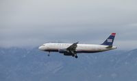 N650AW @ ONT - On final to runway 26R - by Helicopterfriend