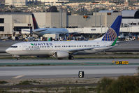 N76516 @ LAX - United Airlines Eco Skies N76516 (FLT COA17) on Taxiway Papa holding short of RWY 25R after arrival from Newark Liberty Int'l (KEWR) on RWY 25L. New United titles.