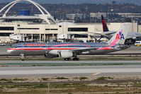 N664AA @ LAX - American Airlines N664AA (FLT AAL239) holding short of RWY 25R at Taxiway Papa after arrival from Luis Munoz Marin Int'l (TJSJ/SJU). This aircraft's scheme is in recognition of the Susan G Komen breast cancer awareness program. - by Dean Heald
