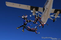 N128WJ @ E60 - Skydivers exit a Twin Otter over Skydive Arizona - by Dave G