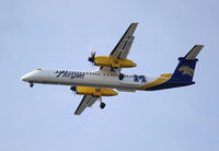 N403QX @ KSEA - Seen in the colors of the Montana State University Bobcats is N403QX. Aircraft seen on approach to SEA. - by Joe G. Walker