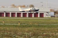 N5696W @ TDZ - Arriving at the EAA breakfast fly-in at Toledo, Ohio - by Bob Simmermon