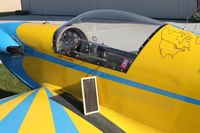 N7724 @ TDZ - Using a solar device to charge the battery at the EAA breakfast fly-in at Toledo, Ohio