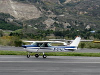 N704UT @ SZP - 1976 Cessna 150M, Continental O-200 100 Hp, landing roll Rwy 04 - by Doug Robertson