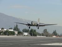 N45366 @ CCB - A graceful lady prepares to settle down on runway 24 - by Helicopterfriend