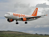G-EZBO @ EGNS - On finals for Runway 26 with EZY635 - by Manxman